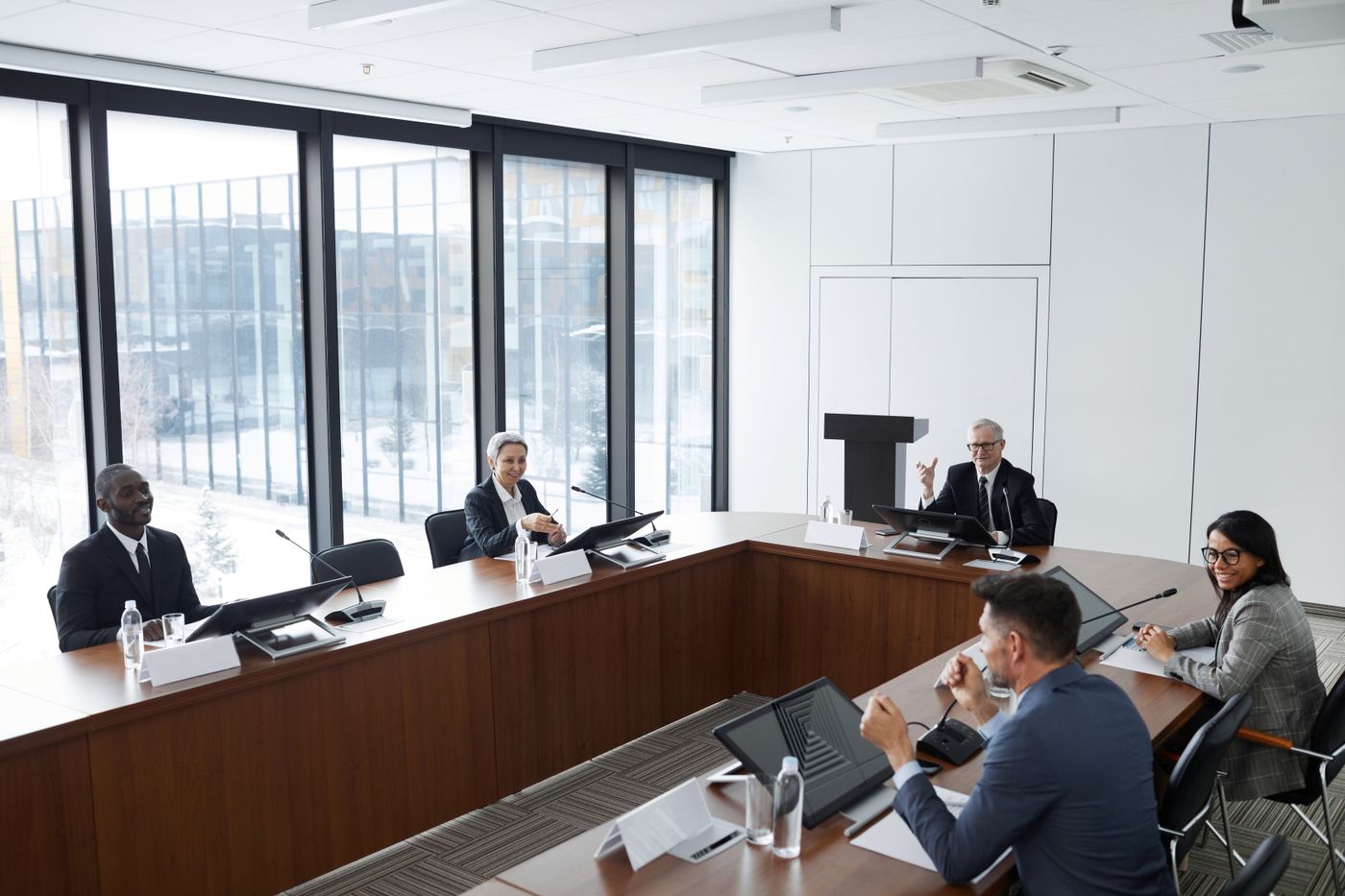 A working discussion around a bright conference table